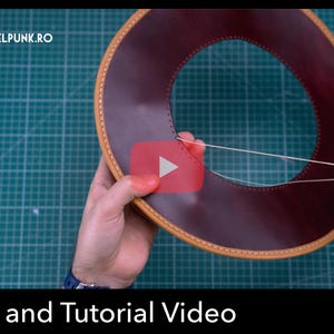 May include: A circular piece of dark burgundy leather with light tan stitched edges being hand-sewn with white thread. The image includes the text DIESELPUNK.RO, a red play button icon, and a circular red PDF DOWNLOAD button with white text.
