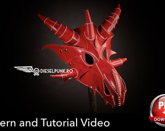 May include: A handcrafted red leather dragon mask with white stitching and horns. The mask has eye openings and is displayed against a dark background. The text "Pattern and Tutorial Video" is at the bottom.