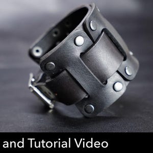 May include: A wide black leather cuff bracelet featuring a woven design secured with silver-toned metal rivets. The bracelet includes a metal buckle closure and visible eyelets for adjustment. The text Pattern and Tutorial Video is displayed.