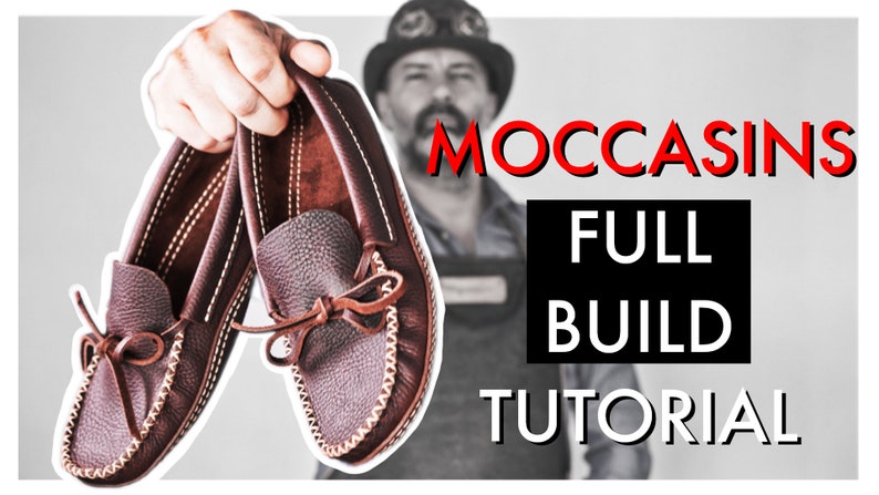 May include: A pair of brown leather moccasins with a decorative stitch pattern. The moccasins are held up by a hand, with the text "MOCCASINS FULL BUILD TUTORIAL" in the background.