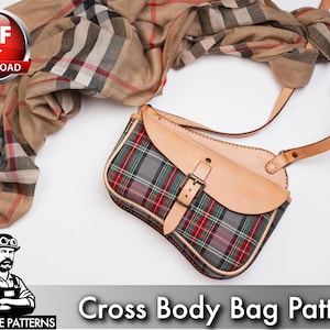 May include: A cross body bag pattern with a plaid design, tan leather flap, and adjustable strap. A tan and plaid scarf is draped in the background. The image also includes the text "Cross Body Bag Pattern".