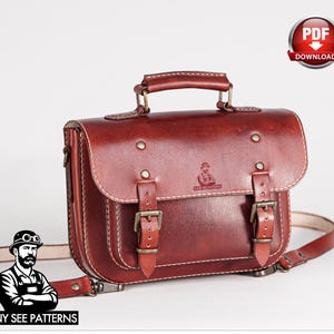 May include: A reddish-brown leather satchel with a top handle and adjustable shoulder strap. The bag features two front buckles and a small logo. The image also includes the text "TONY SEE PATTERNS" and a "PDF DOWNLOAD" graphic.