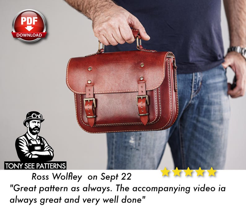 May include: A reddish-brown leather satchel with a top handle and two front buckles. The bag is held by a person wearing blue jeans and a navy blue shirt. The image includes the text "PDF DOWNLOAD" and a customer review.