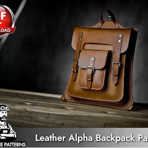 May include: A tan leather backpack featuring a front pocket with a buckle closure, a main flap secured by two vertical straps with buckles, and visible white stitching along the edges. The text PDF DOWNLOAD and Leather Alpha Backpack Patterns appear.