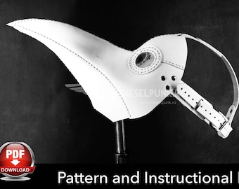May include: A white leather plague doctor mask with a long beak and a strap for the head. The mask is on a black background and has a PDF download button in the lower left corner. The text "Pattern and Instructional File" is below the mask.