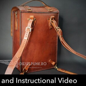 May include: Back view of a brown leather backpack with adjustable straps and brass buckles. The backpack has a stitched design and the text "DIESELPUNK.RO" is visible on the back.