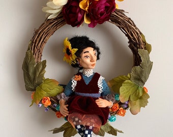 Autumnal Door Hanger: A Handcrafted Doll Amidst Fall Blooms, Door & Wall Wreath