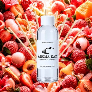 May include: A clear glass reed diffuser bottle with a white cap and six wooden reeds. The label features the text MADE IN AUSTRALIA, the logo C, AROMA KAZ, EXQUISITE LUXURY, and the website www.aromakaz.com. The bottle is centred in the frame.