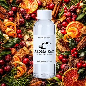 May include: A clear plastic bottle with a white cap and a white label featuring the text MADE IN AUSTRALIA, AROMA KAZ, EXQUISITE LUXURY, and www.aromakaz.com. The bottle is centred against a background of dried orange slices and cinnamon.