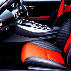 Car interior with black and red seats showing ideal use for aroma bead air freshener, long-lasting vegan car fragrance made in Australia for vehicles, small spaces and odour control.