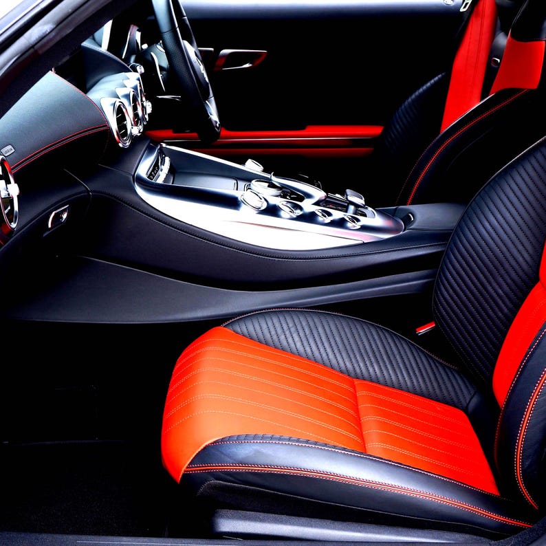 Car interior with black and red seats showing ideal use for aroma bead air freshener, long-lasting vegan car fragrance made in Australia for vehicles, small spaces and odour control.