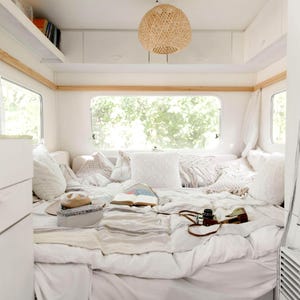 Fresh caravan bedroom space scented with vegan room and linen spray air freshener