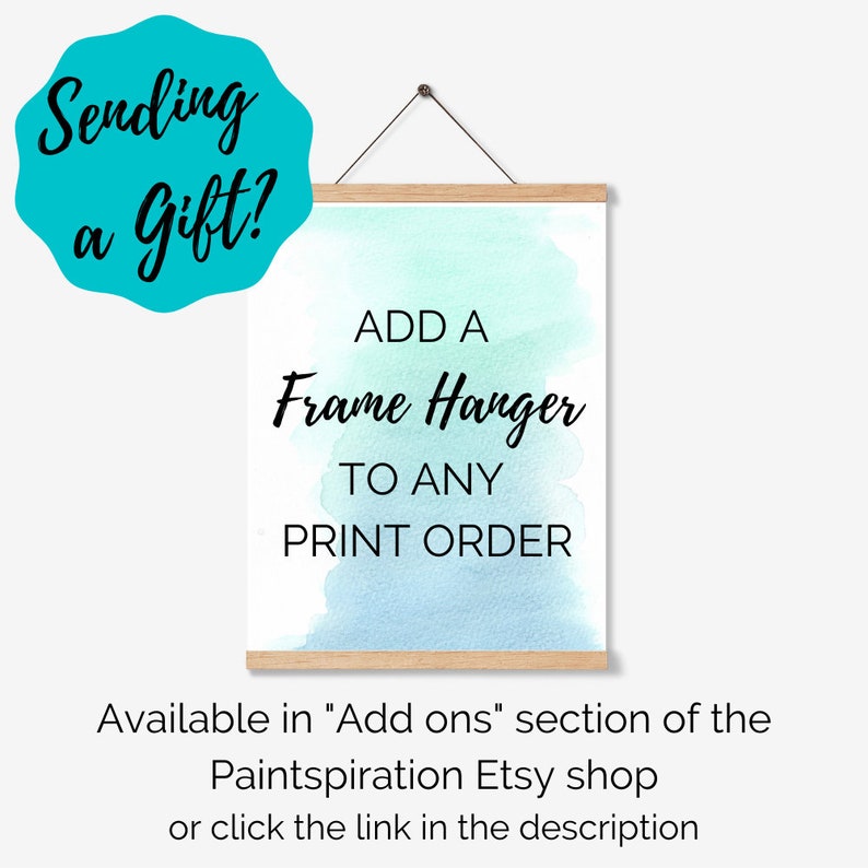 May include: A watercolor print with a blue and green gradient, framed with a wooden hanger. The print has the text "ADD A Frame Hanger TO ANY PRINT ORDER".