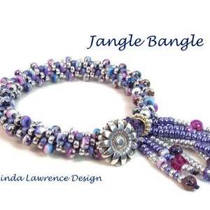 May include: A purple, pink, and silver beaded bangle bracelet with a silver flower charm and a purple, pink, and silver beaded tassel. The bracelet is called "Jangle Bangle".