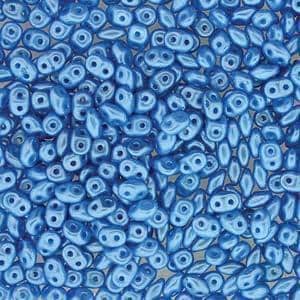 May include: A large quantity of small, light blue, iridescent glass beads in a teardrop shape with two holes.