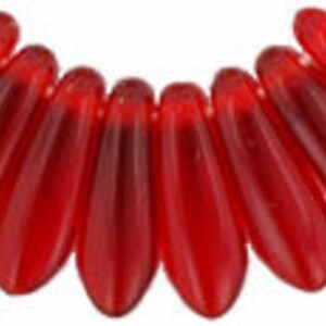 May include: A set of ten red glass beads shaped like teardrops. The beads are arranged in a semi-circle.