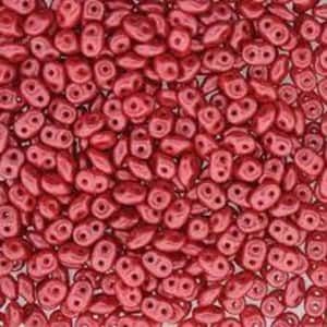 May include: A large quantity of small, red, glass seed beads in a teardrop shape. The beads have two holes and a glossy finish.