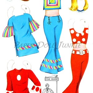 May include: A paper doll set featuring a range of outfits, including a blue dress with colourful stripes, a red top with white polka dots, and a pair of blue bell-bottom trousers with colourful stripes. The set also includes a yellow wig, a geometric patterned top, and a red skirt with white polka dots. The paper doll set is labelled "Mod Square".