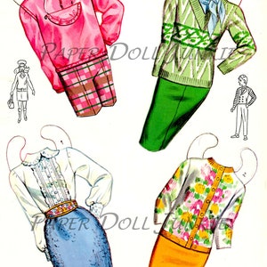 May include: A set of paper doll clothes featuring a pink hooded sweatshirt with a plaid skirt, a green sweater with a green skirt, a white blouse with a blue skirt, and a floral sweater with an orange skirt.