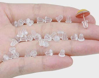 100 (50 pares) tapones de goma suave transparente para pendientes (4 mm)