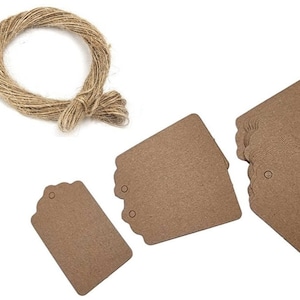 May include: A set of brown kraft paper gift tags with scalloped edges and holes for string. The tags come with a roll of twine.