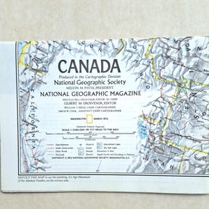 May include: A vintage National Geographic Magazine map of Canada and the United States, published in March 1972. The map features detailed geographical information, including roads, lakes, and elevations, with a scale of 1:7460,000 or 117.7 miles to the inch.