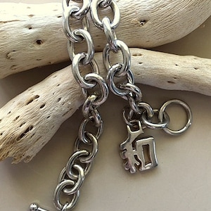 Vintage Sterling Silver Large Link Bracelet with Symbol Charm 7 1/4 Inches  17.60grams