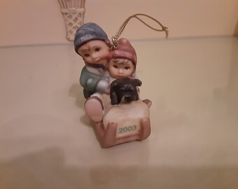 Very small Hummel look alike ornament