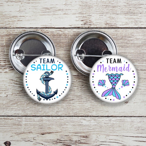 Team Mermaid and Team Sailor gender reveal pins with purple and blue.  Perfect for mermaid or sailor themed party.