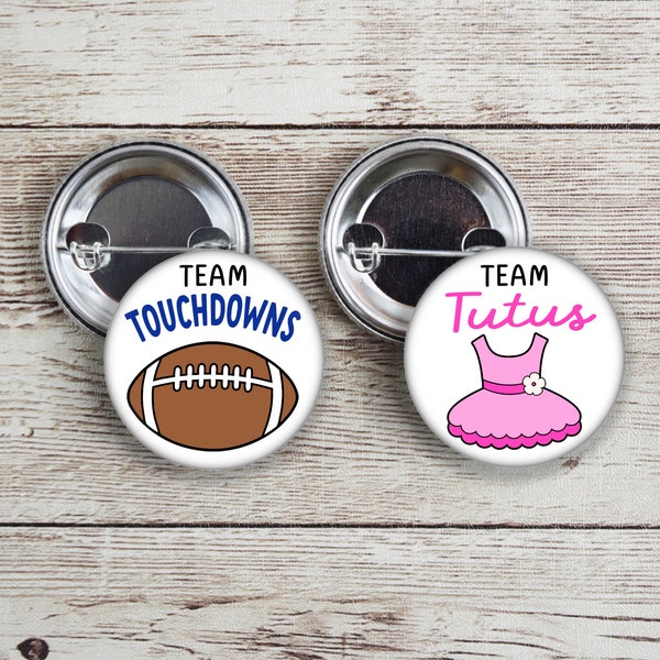 Team Touchdowns and Team Tutus brown football with blue text and pink tutu with pink text gender reveal pins for football themed party!