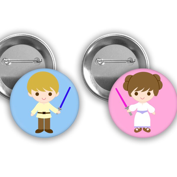 Little jedi girl and boy gender reveal pins with pink and blue background.