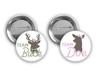 Team Buck and Team Doe gender reveal pins with dark brown silhouette and light pink and green bows.  Perfect for Buck or Doe themed party.