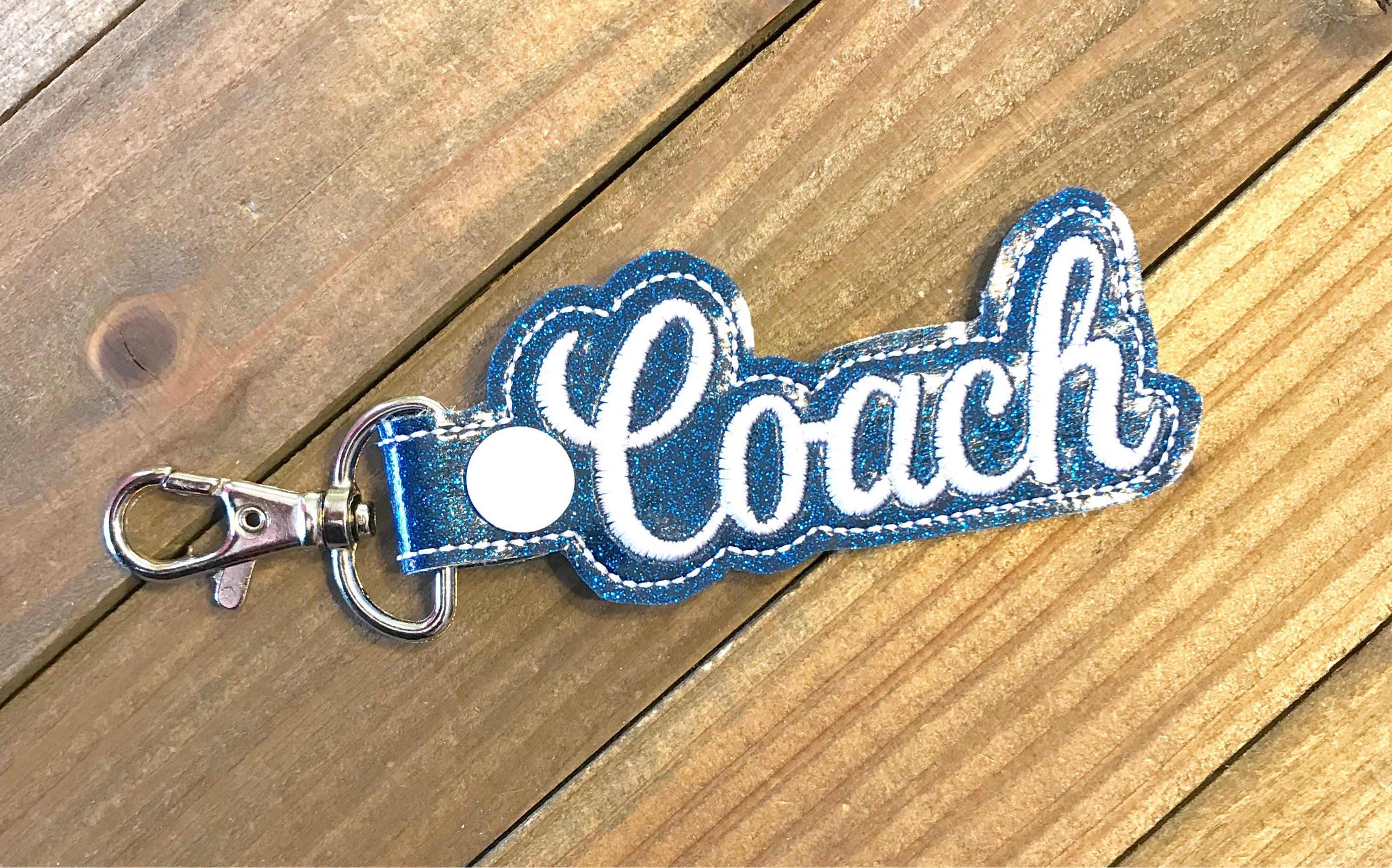 coach bag tag