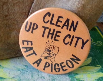 Clean Up The City Eat A Pigdeon pinback button, funny pinback button, protest button, hippie button, clean up the city, eat a pigeon