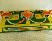 Vintage moving tin train. Wind up factory train. Soviet toy. The train  brings USSR workers to factory. LOOK at the VIDEO