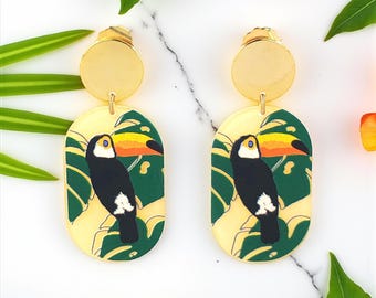 Toucan and tropical leaves dangle acrylic earrings