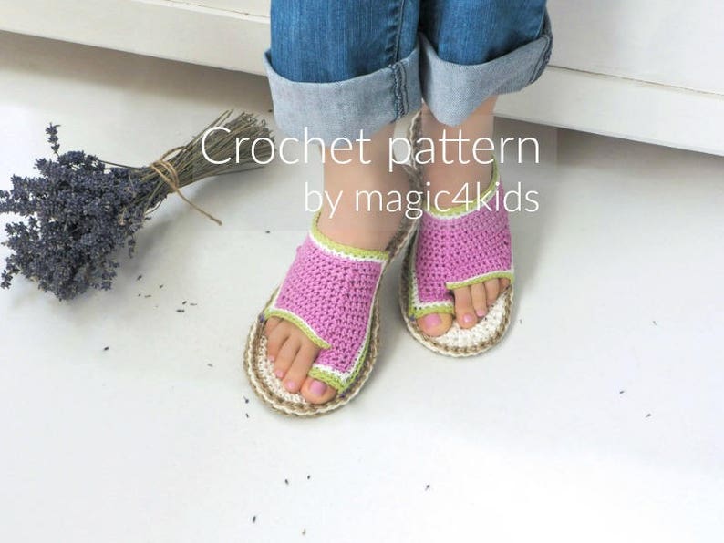 May include: Crochet pattern by magic4kids. A pair of pink and green crocheted sandals with a white sole.
