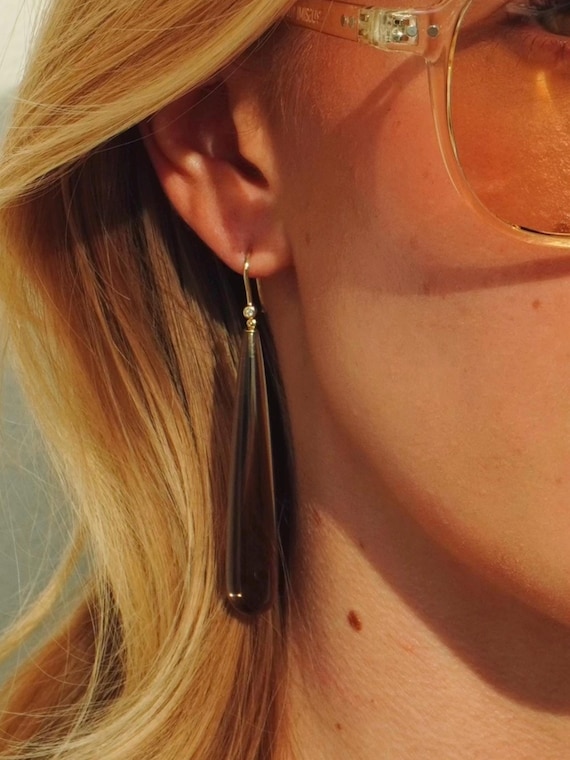The Agnes Earrings with freshwater pearls.