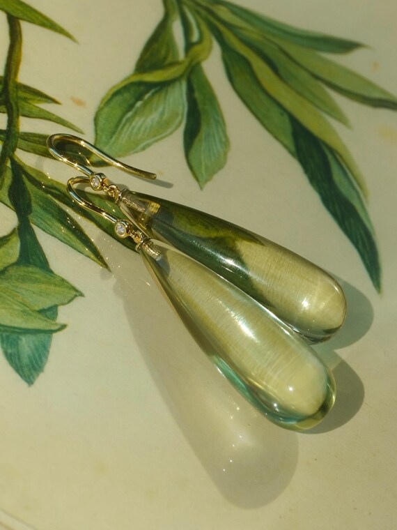 The Agnes Earrings with freshwater pearls.