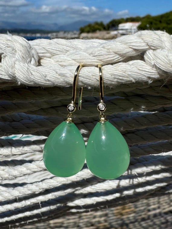 The Agnes Earrings with freshwater pearls.
