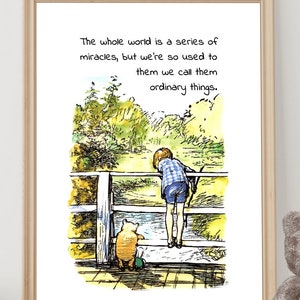 May include: A Winnie the Pooh-inspired print featuring a boy and a bear cub standing on a wooden bridge overlooking a stream. The print includes the quote "The whole world is a series of miracles, but we're so used to them we call them ordinary things."