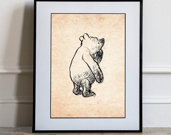 Puede incluir: Un dibujo en blanco y negro de un oso de pie sobre sus patas traseras, mirando hacia arriba. El dibujo está sobre un fondo beige y enmarcado en un marco negro.