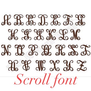 May include: A set of uppercase letters in a decorative scroll font. The letters are brown and are arranged in alphabetical order.