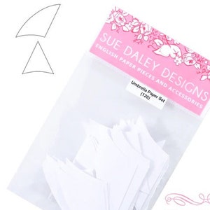 May include: A package of 120 white paper umbrella shapes for crafting. The package is labeled "Sue Daley Designs English Paper Pieces and Accessories Umbrella Paper Set (120)".
