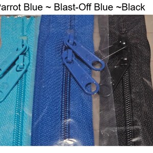May include: Three zipper closures in different colors: parrot blue, blast-off blue, and black. The zippers are packaged in clear plastic.