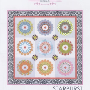 May include: A quilt pattern featuring a starburst design with nine colorful circles. The quilt is titled "Starburst Quilt" and is by Sue Daley Designs.