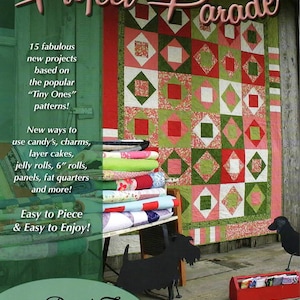 May include: A colorful quilt with red, green, and white square patterns hangs on a wooden wall. The text "Project Parade" is at the top. Below, a stack of folded quilts sits on a table. The image also includes the text "Pieced Tree Patterns".