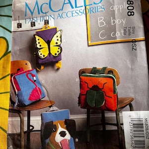 May include: McCall's Fashion Accessories pattern featuring backpack designs. The backpacks include a butterfly, a flamingo, a dog, and a beetle. The pattern is labeled M6808 and includes size OSZ.