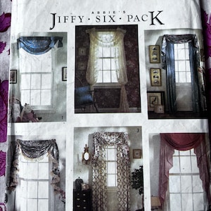 May include: A Simplicity pattern for six different window treatments. The pattern is called "Jiffy Six Pack" and is designed by Abbie's. The pattern shows five different window treatments, each with a different style and fabric. The pattern is printed on a white background with black text.