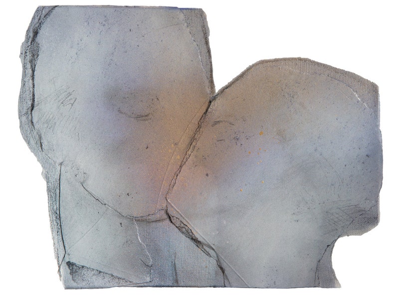 A romantic abstract portrait of a love couple kiss in greige, dovetail and silver grey on white. The two heads are composed of torn paper layers. The grungy edges give the smooth texture a mural feel. The kiss is accented with a hue of a golden glow.
